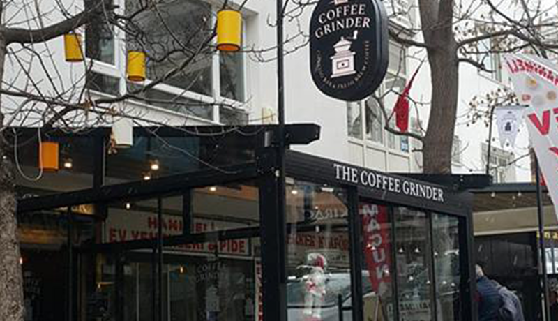 THE COFFEE GRINDER